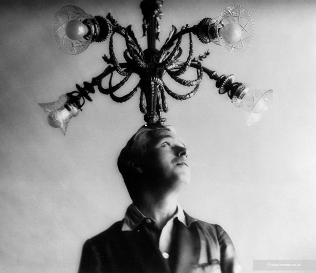 8. Lee Miller,
Charlie Chaplin au lustre
Charlie Chaplin with light fixture
Saint-Moritz
1932
© Lee Miller Archives England 2026
All Rights Reserved